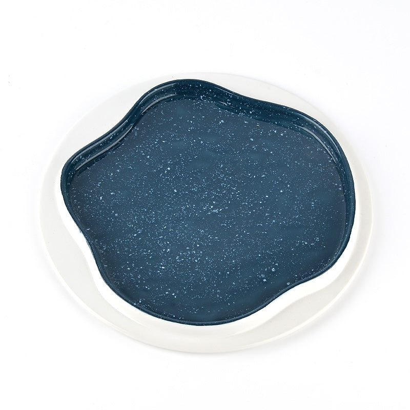 a blue dessert plate